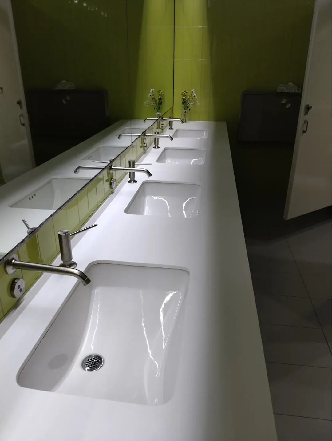 Freshly cleaned commercial restroom sinks