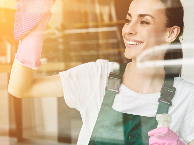 woman cleaning windows